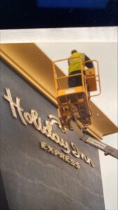 Holiday Inn Hotel Signage, installation. London Signage, illuminated sign makers soho.