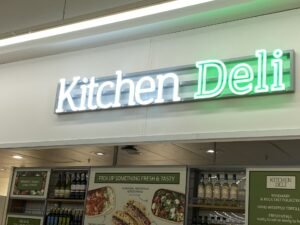 Custom-designed vibrant neon lights sign makers project showing high-quality glass finish. Signage Company London & Home Counties.