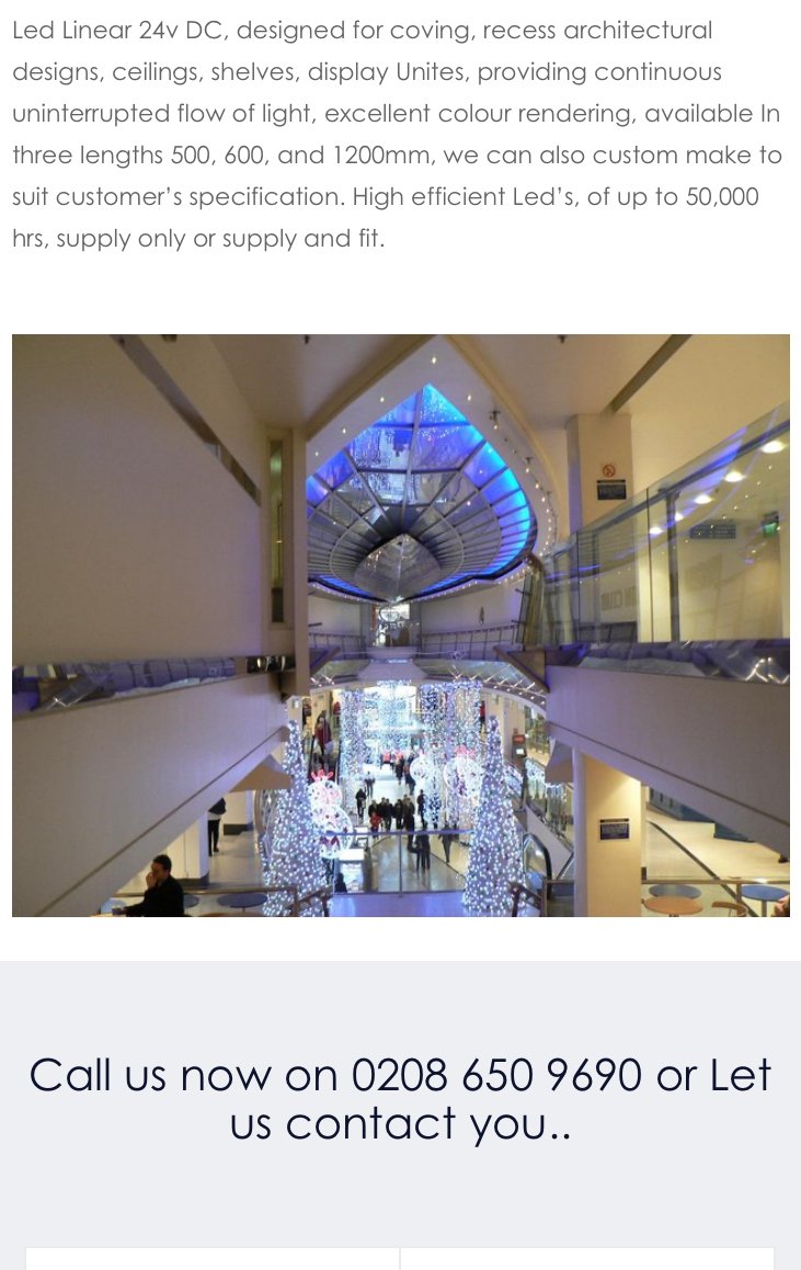 High level glass ceiling atrium inside The Plaza Shopping Centre on Oxford Street London featuring custom color changing DMX LED controlled mood lighting