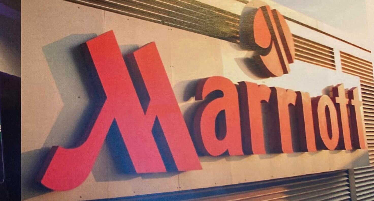 Bespoke illuminated exterior hotel signage manufactured and installed by commercial sign makers Moderneon for Marriott Hotels.