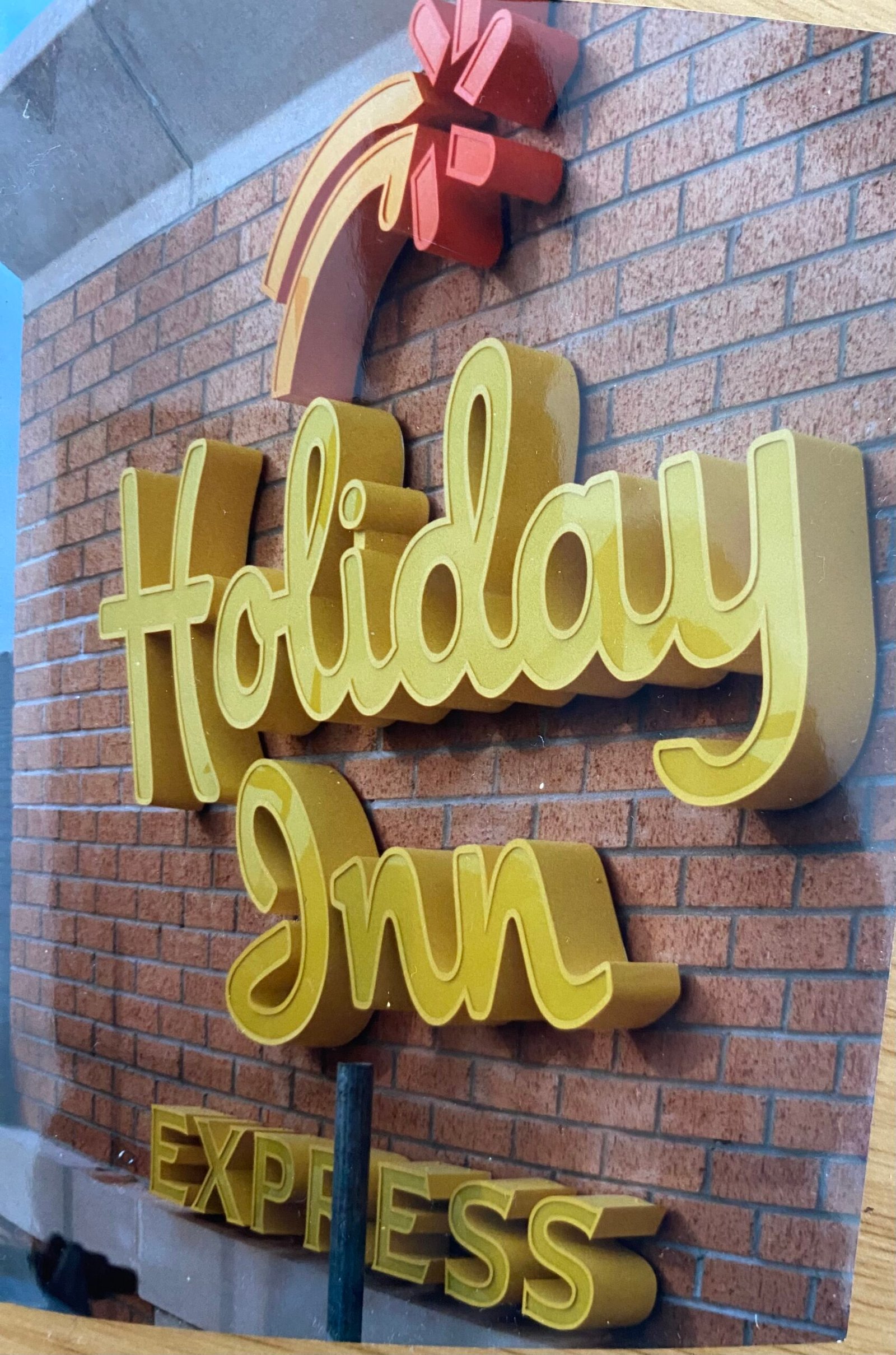 Bespoke 3D built-up brass lettering crafted by custom sign makers at the Moderneon London workshop