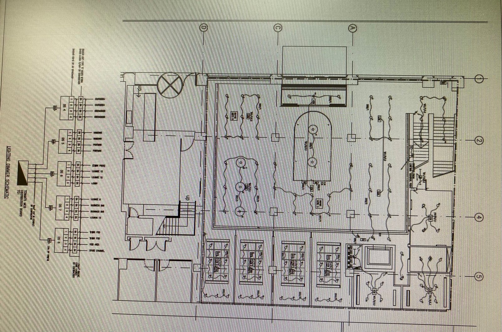 Technical architectural lighting layout plan showing blueprint specifications for a commercial building interior